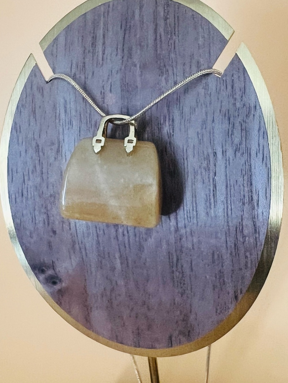 Semi precious purse pendant plus a gold plated necklace